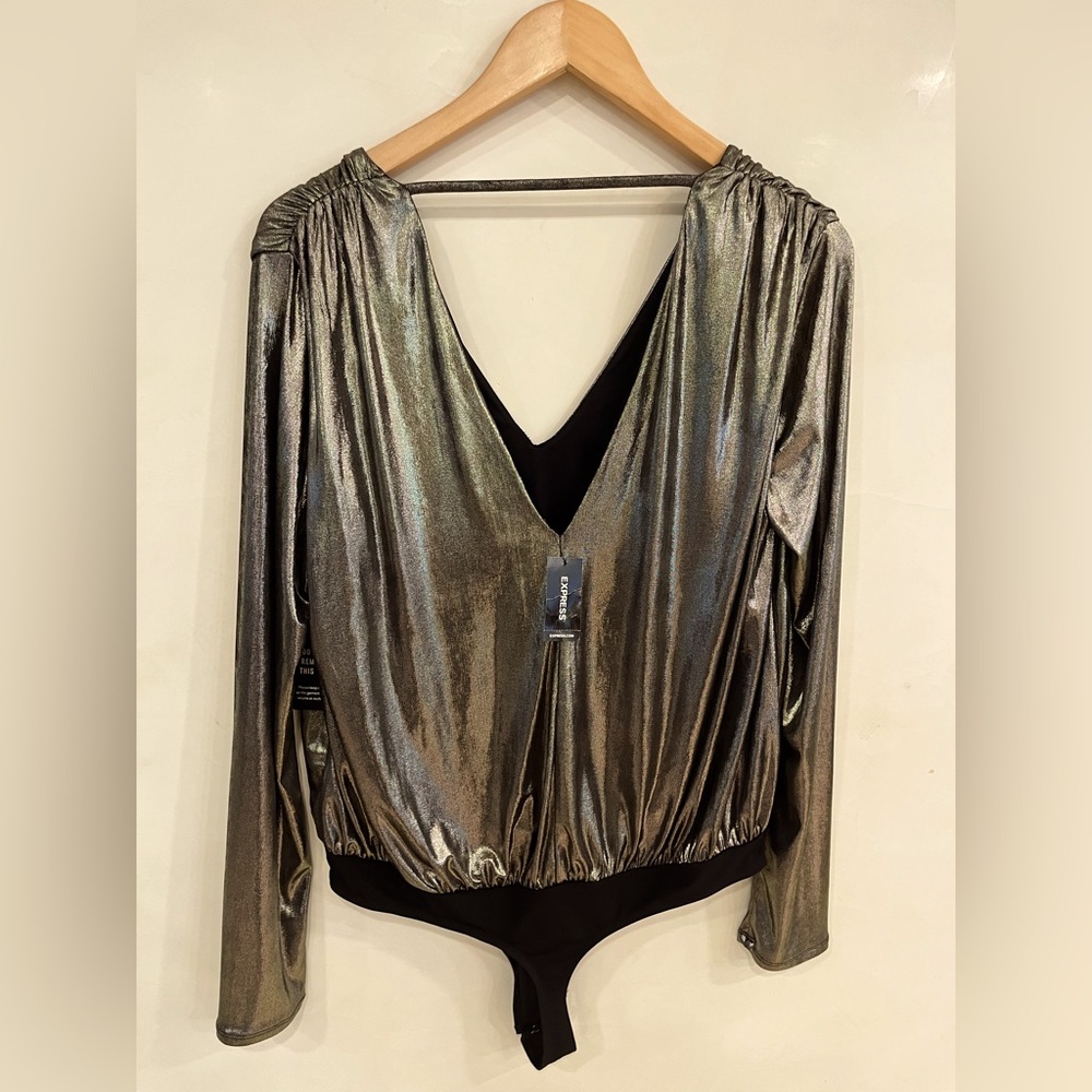 New with tags bodysuit never worn and very comfortable